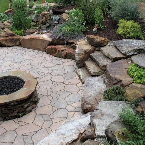 Stone and brick natural outdoor fire pit