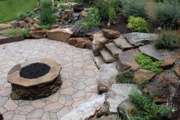 Stone and brick natural outdoor fire pit