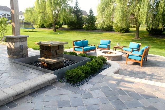 Outdoor stone patio with fire pit