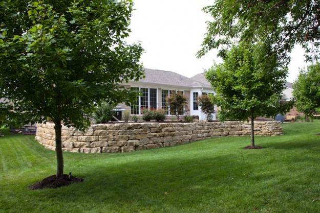 Backyard with natural stone wall