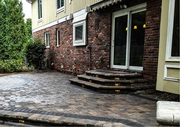 Backyard patio steps with patio