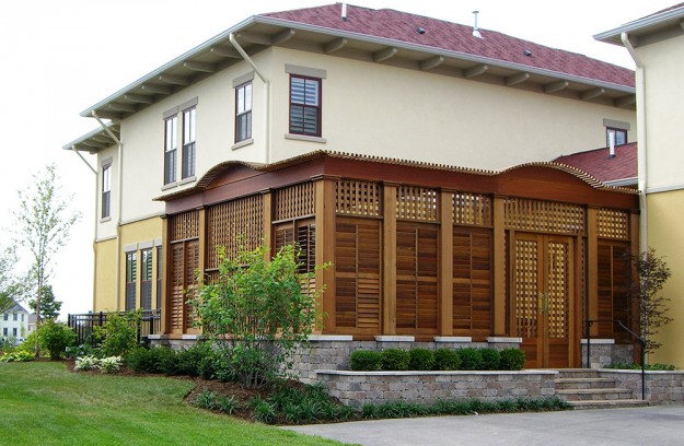 Wooden covered courtyard with stone walls