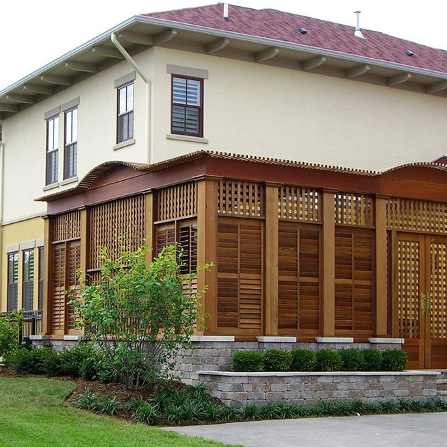 Wooden covered courtyard with stone walls