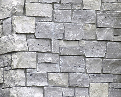 Gray cobble creek stone wall