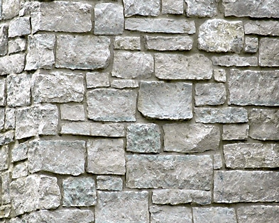White to gray rubble stone wall